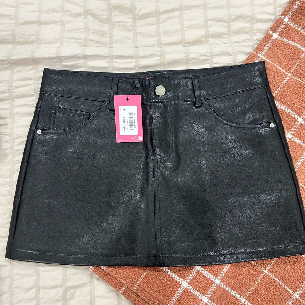 Edikted Black Faux Leather Mini Skirt with Front Pockets